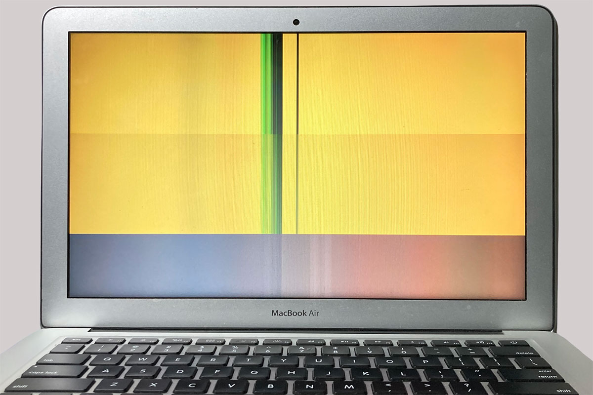 MacBook Air with cracked screen before repair