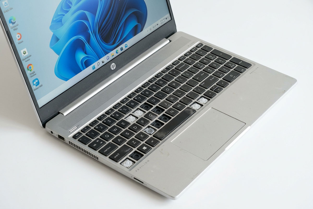 HP laptop with worn keyboard before replacement