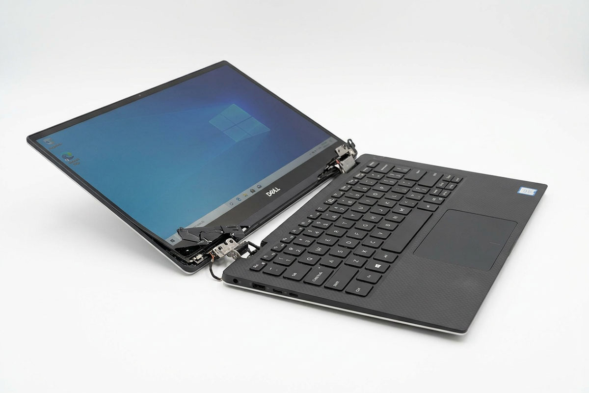 Dell laptop with broken hinge before repair